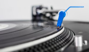 DJ needle on vinyl record