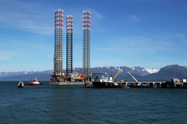 Jackup oil drilling rig in the Kachemak Bay, Alaska clipart