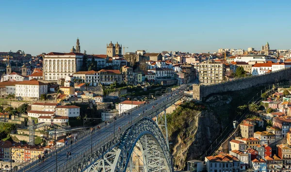A picture of Porto and the D. Luis I Bridge\'s upper deck.
