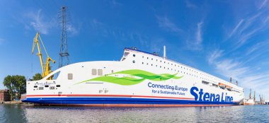 A picture of a large passenger and roll on-roll off cargo ship from Stena Line docked in the Gdansk Shipyard.