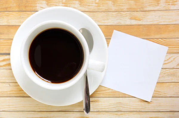 Papel y taza en blanco — Foto de Stock