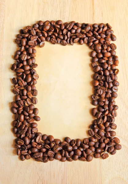Beans as frame with paper — Stock Photo, Image