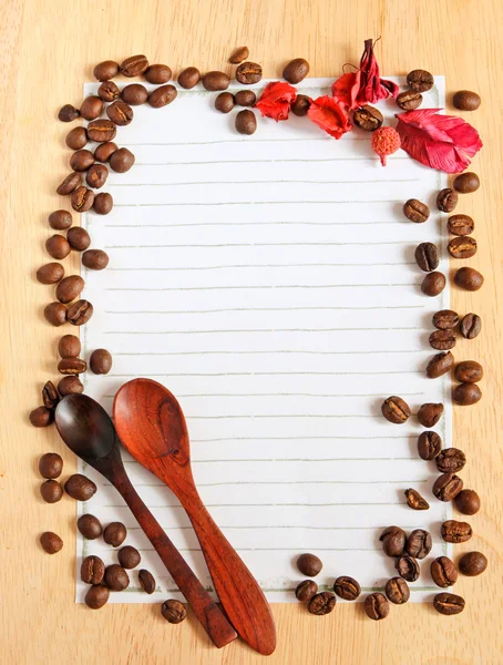 Beans and spoon with paper — Stock Photo, Image