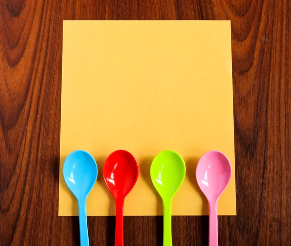 Spoons with paper — Stock Photo, Image