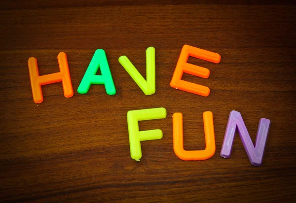 Have fun in toy letters — Stock Photo, Image