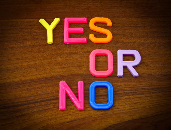 Yes or no in toy letters — Stock Photo, Image