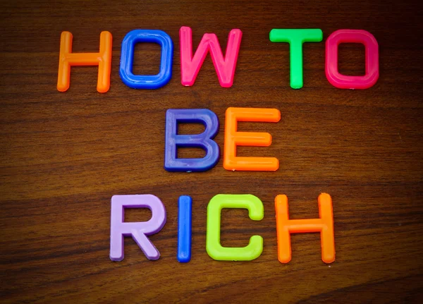 How to be rich in colorful letters — Stock Photo, Image