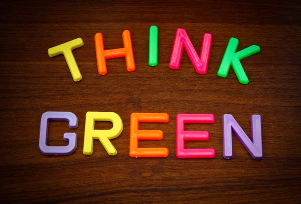 Think green in colorful letters — Stock Photo, Image
