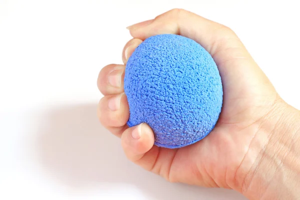 Hand squeezing ball — Stock Photo, Image