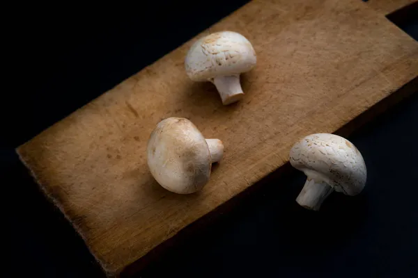 Champignon Mushrooms Wooden Board Black Background — Stock Photo, Image