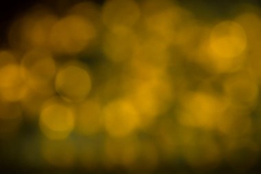 Bokeh soyut dokusu. Renkli. Odaklanmamış arka plan. Bulanık parlak ışık. Dairesel noktalar.
