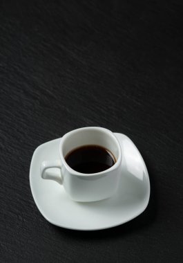 close-up shot of cup of coffee on black background