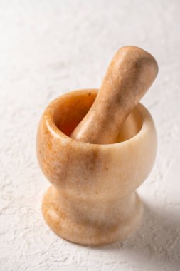 close-up shot of stone mortar on white background