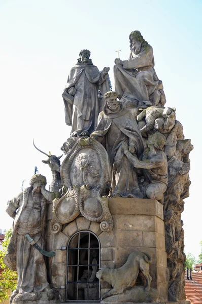 Statues of Saints John of Matha, Felix of Valois, and Ivan on the Charles Bridge in Prague — Stock Photo, Image