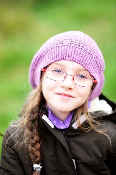 Portrait of little girl in pink hat — Stock Photo, Image