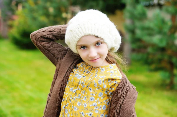 Child girl in white cap, close-up portrait — Stock Photo, Image