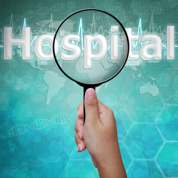 Hospital , word in Magnifying glass , background medical — Stock Photo, Image