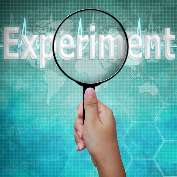 Experimento, palabra en lupa, fondo médico — Foto de Stock