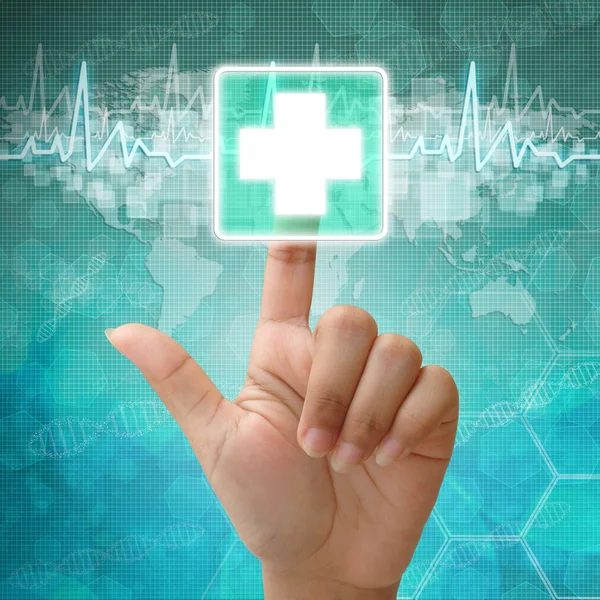 Hand press on First Aid Symbol , medical background — Stock Photo, Image