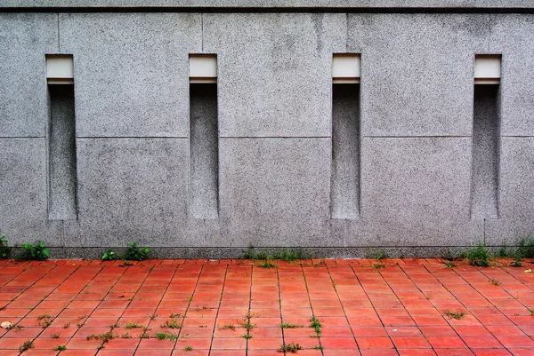 Concrete parete e rosso mattonelle pavimento di sfondo — Foto Stock