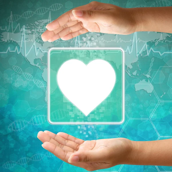Lékařské ikonu srdce v ruce — Stock fotografie