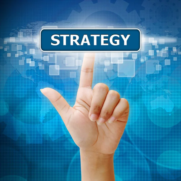 Premere a mano sul pulsante STRATEGIA — Foto Stock