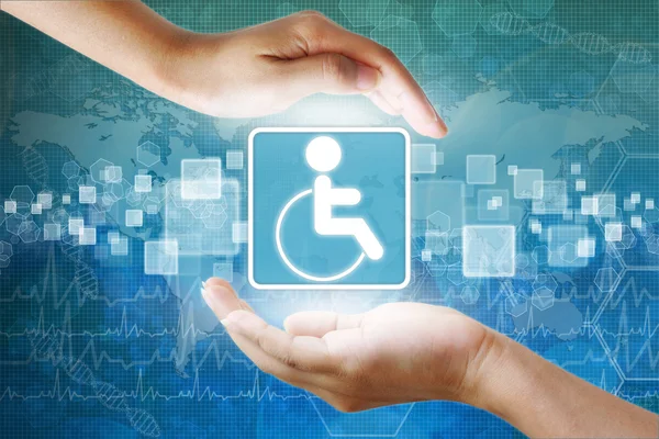 Medical icon, Disabled symbol in hand — Stock Photo, Image