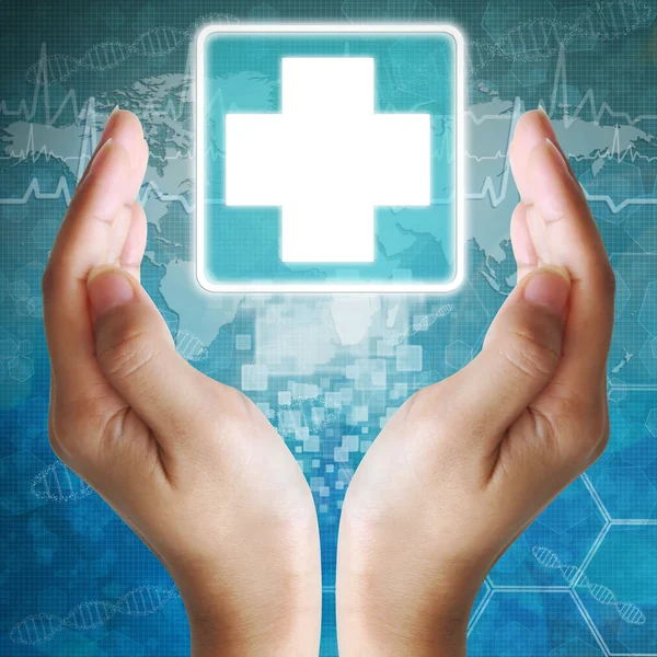 Піктограма першої допомоги в руці, медичний фон — стокове фото