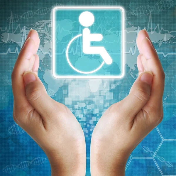 Niepełnosprawnych ikona w ręku, wykształcenie medyczne — Zdjęcie stockowe