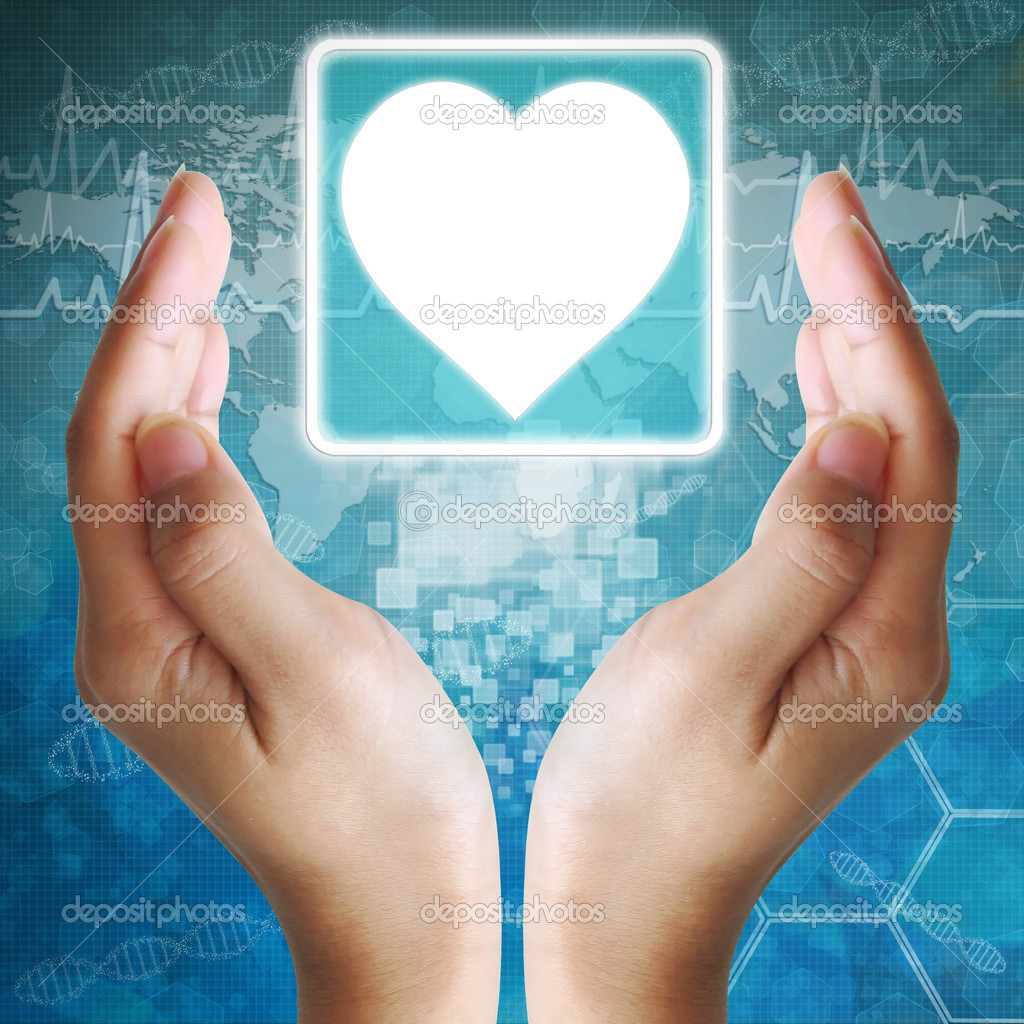Heart icon in hand , medical background