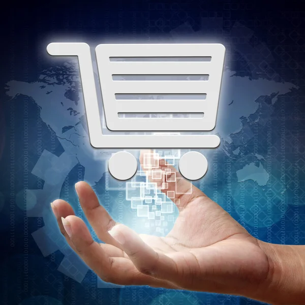 Shopping cart symbol on hand, Business background — Stock Photo, Image