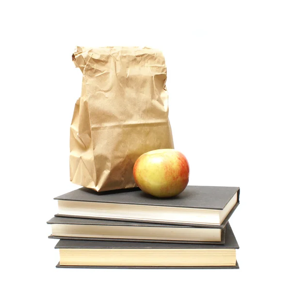 Mittagessen und Schulbücher — Stockfoto