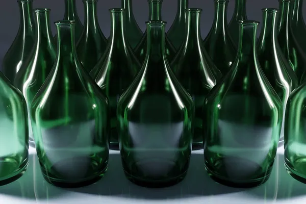 几瓶绿色玻璃瓶在灰色孤立的背景上排成两排 — 图库照片