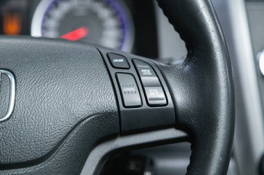 Novosibirsk, Russia - November 09, 2021:  Honda CR-V,  steering wheel with multifunction buttons for quick control phone, music and other functio