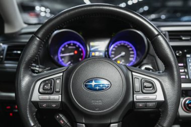 Novosibirsk, Russia - November 09, 2021: Subaru Outback,  dashboard, player, steering wheel with logo and buttons, speedometer and tachomete