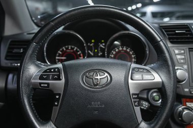 Novosibirsk, Russia - December 01, 2021: Toyota Highlander,  dashboard, player, steering wheel with logo and buttons, speedometer and tachomete