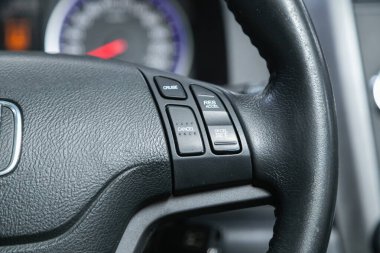 Novosibirsk, Russia - November 09, 2021:  Honda CR-V,  steering wheel with multifunction buttons for quick control phone, music and other functio