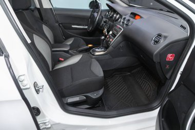 Novosibirsk, Russia - October 30, 2021:  Peugeot 308  , dashboard, player, steering wheel, accelerator handle, buttons, seats. 