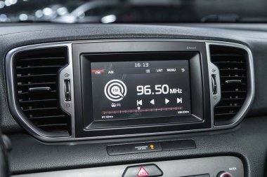 Novosibirsk, Russia - December 09, 2021:  Kia Sportage    , audio system concept. Music player in car.