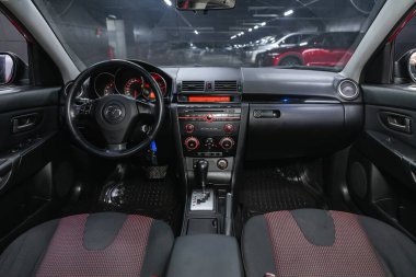 Novosibirsk, Russia - December    09 , 2021: Mazda 3, steering wheel, shift lever, multimedia  systeme, driver seats and dashboar