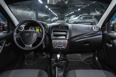 Novosibirsk, Russia - January    01 , 2022:  Lada Kalina, steering wheel, shift lever and dashboard, climate control, speedometer, display