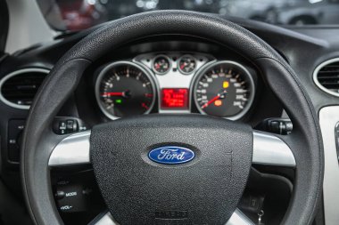 Novosibirsk, Russia - December    01 , 2021:  Ford Focus,  car interior - steering wheel, shift lever and dashboard