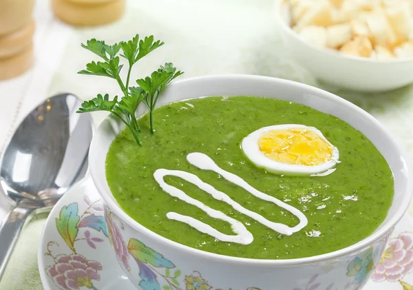 Cream soup with egg and sour cream — Stock Photo, Image