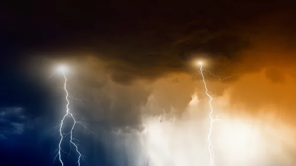 Stormy sky with lightnings and rain — Stock Photo, Image