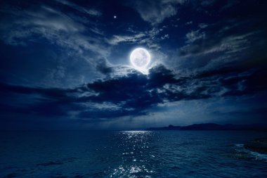 Full moon over sea clipart