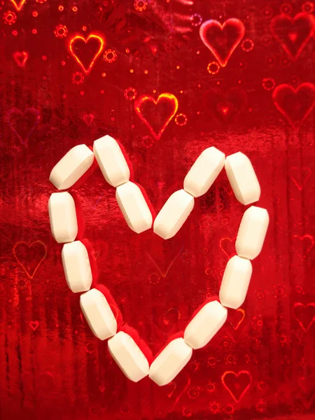 A szeretet tabletták Stock Kép