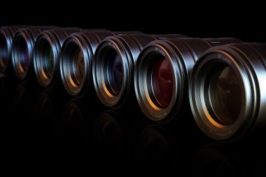 Camera lenses in a row clipart