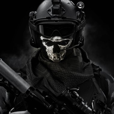 Portrait closeup of a elite special forces military soldier equipped with battle armor ,advanced assault rifle and a custom skull face mask  . 3d rendering clipart