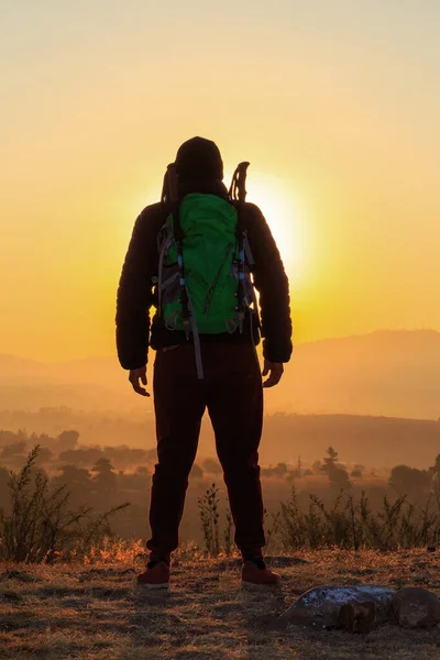 Hiker Backpack Standing Rock Enjoying Sunset —  Fotos de Stock