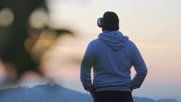 Young Latin Man Using 360 Headset Sunset — Wideo stockowe